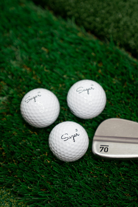 golf ball on green grass
