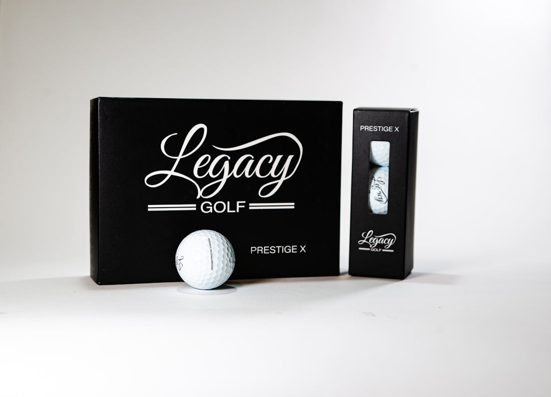 a black box with a white golf ball inside of it