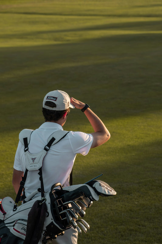 A golfer looks towards the green.