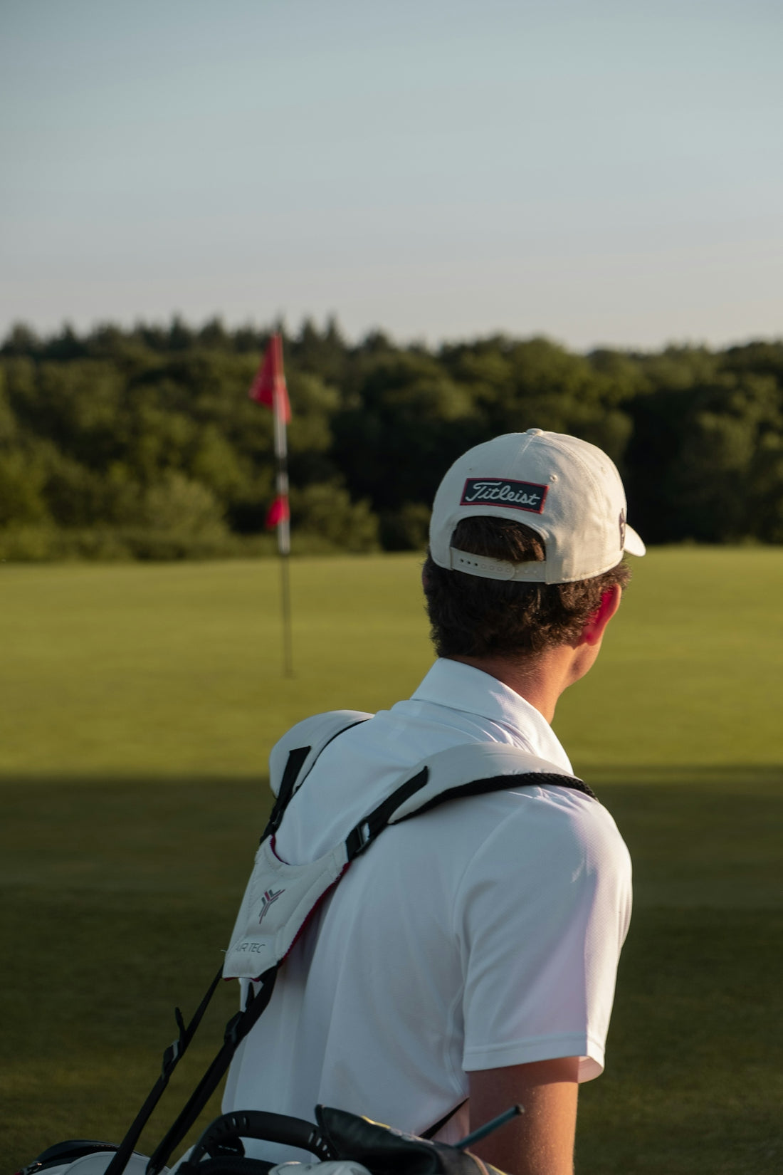 Golfer contemplates his next shot on the course